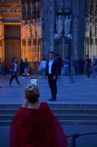 Woman standing in city