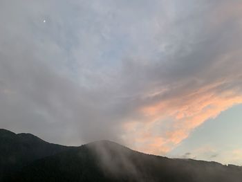 Scenic view of mountains against sky during sunset