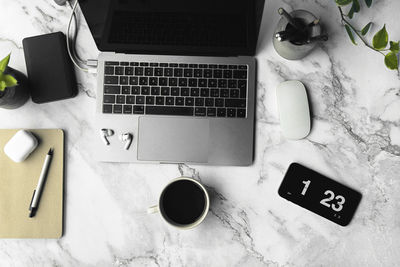 High angle view of coffee cup on table