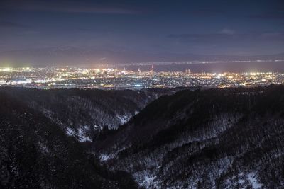 Illuminated cityscape at night