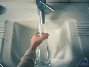 Close-up of water flowing from faucet