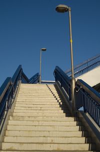 Low angle view of stairs against clear sky