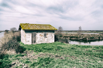 Built structure on land against sky