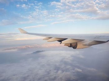 Low angle view of airplane flying in sky