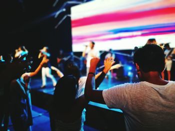 Rear view of people at music concert