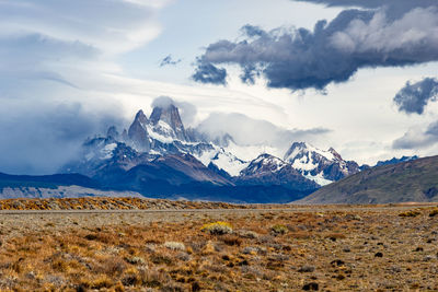 Scenic view of snowcapped mountains against sky