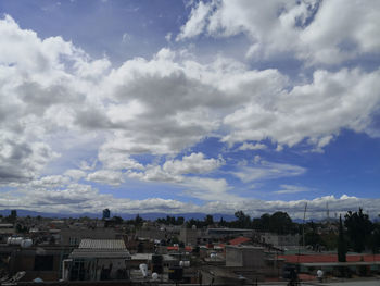 High angle shot of townscape against sky