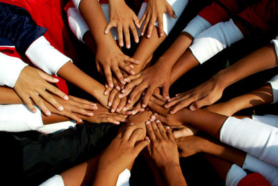 High angle view of people holding hands