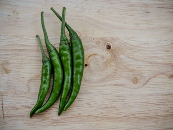 High angle view of green chili pepper on table