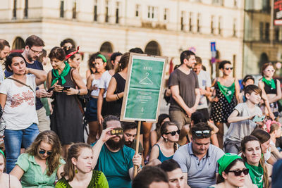 Group of people standing in city