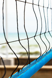 Beach volleyball net close up. vertical image.