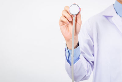 Midsection of man holding hands