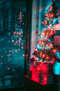 Illuminated christmas tree at night