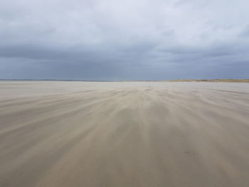 Scenic view of desert against sky