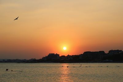 View of sea against orange sky