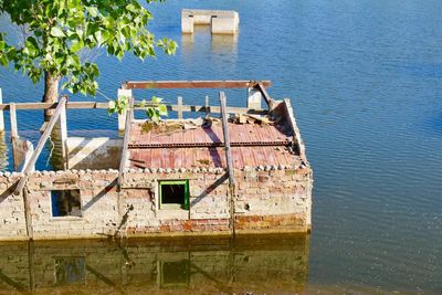 Abandoned building by sea