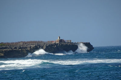 Scenic view of sea against clear sky