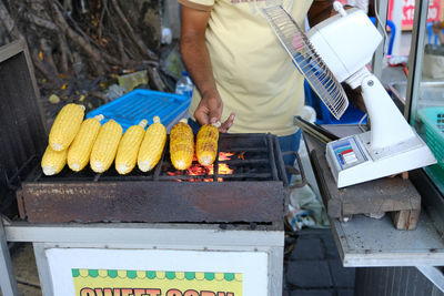 Man working at market stall