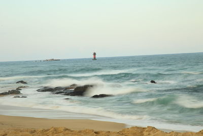 Scenic view of sea against clear sky