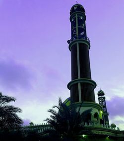 Low angle view of statue against sky