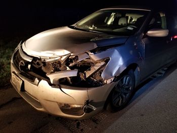 High angle view of broken car on street