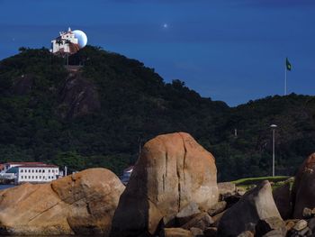 Scenic view of rock formations against sky