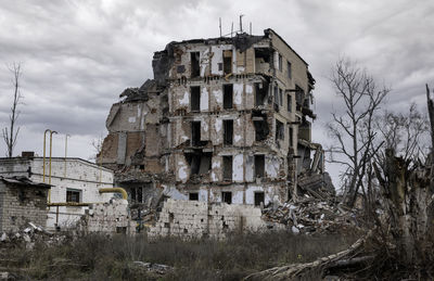 Low angle view of old building against sky