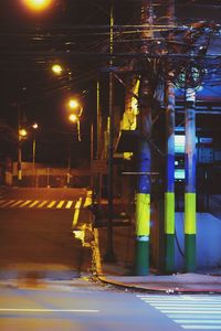 Illuminated road at night