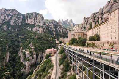 Panoramic view of bridge and mountains against sky