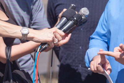 Close-up of man holding camera