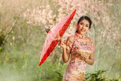 Woman holding umbrella