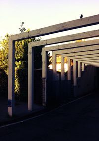 Built structure against sky at sunset