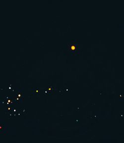 Scenic view of moon against sky at night