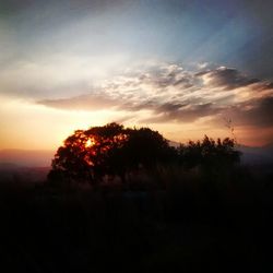 Scenic view of landscape at sunset