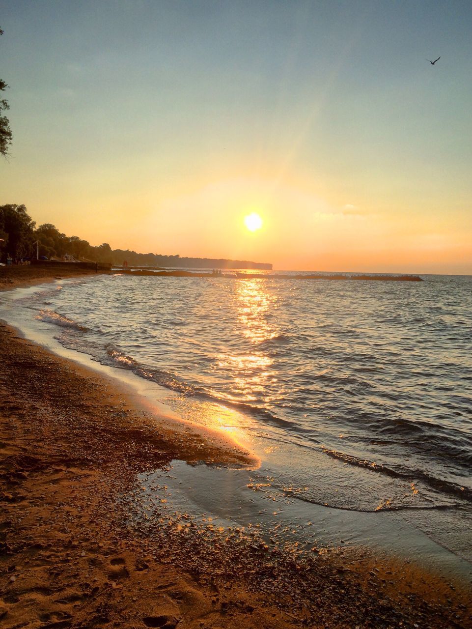 water, sunset, sea, beach, sun, horizon over water, scenics, tranquil scene, shore, beauty in nature, tranquility, reflection, orange color, sky, idyllic, sand, nature, sunlight, wave, outdoors