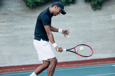 Man playing tennis