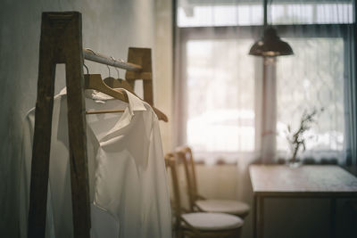 Shirt hanging in rack at home