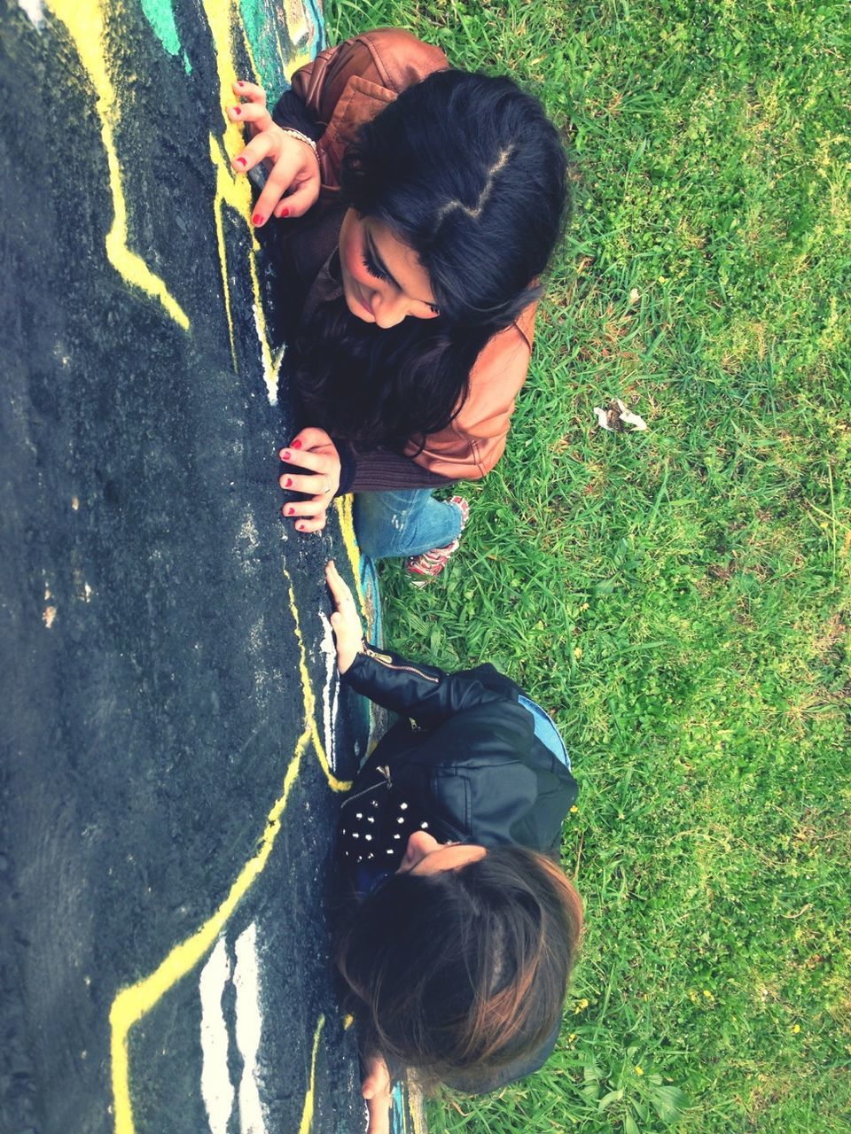 lifestyles, leisure activity, childhood, person, elementary age, casual clothing, girls, high angle view, cute, innocence, boys, holding, grass, playing, full length, three quarter length, smiling, happiness