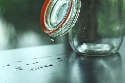 Close-up of glass jar on table