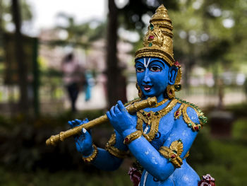 Close-up of statue against temple