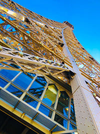 Low angle view of building against blue sky