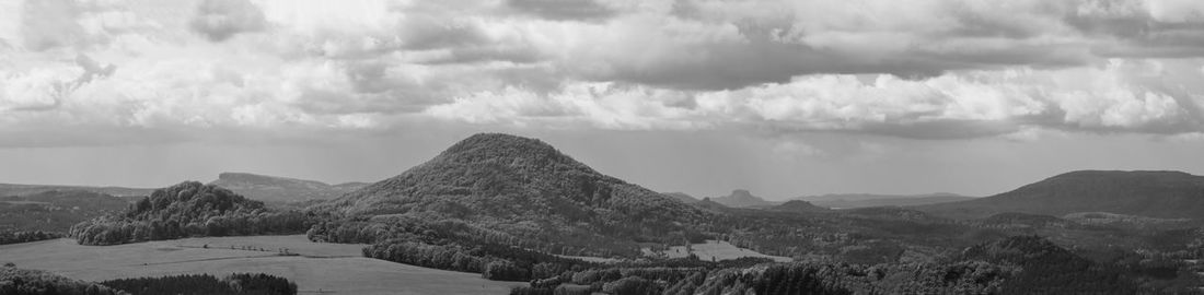 Panoramic view of mountains against sky