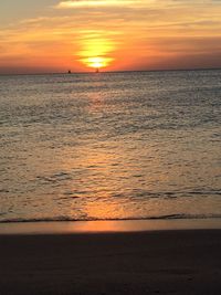 Scenic view of sea at sunset