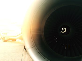 Close-up of airplane wing against sky