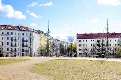 Houses against sky in city