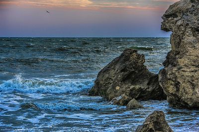 Scenic view of sea at sunset