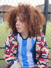 Portrait of young boy looking away