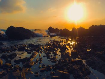 Scenic view of sea against sky during sunset