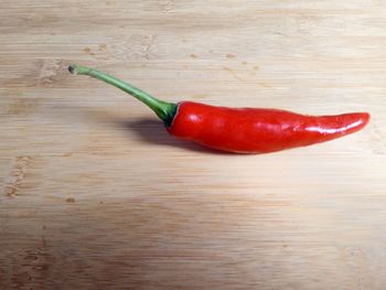 High angle view of red chili peppers on table