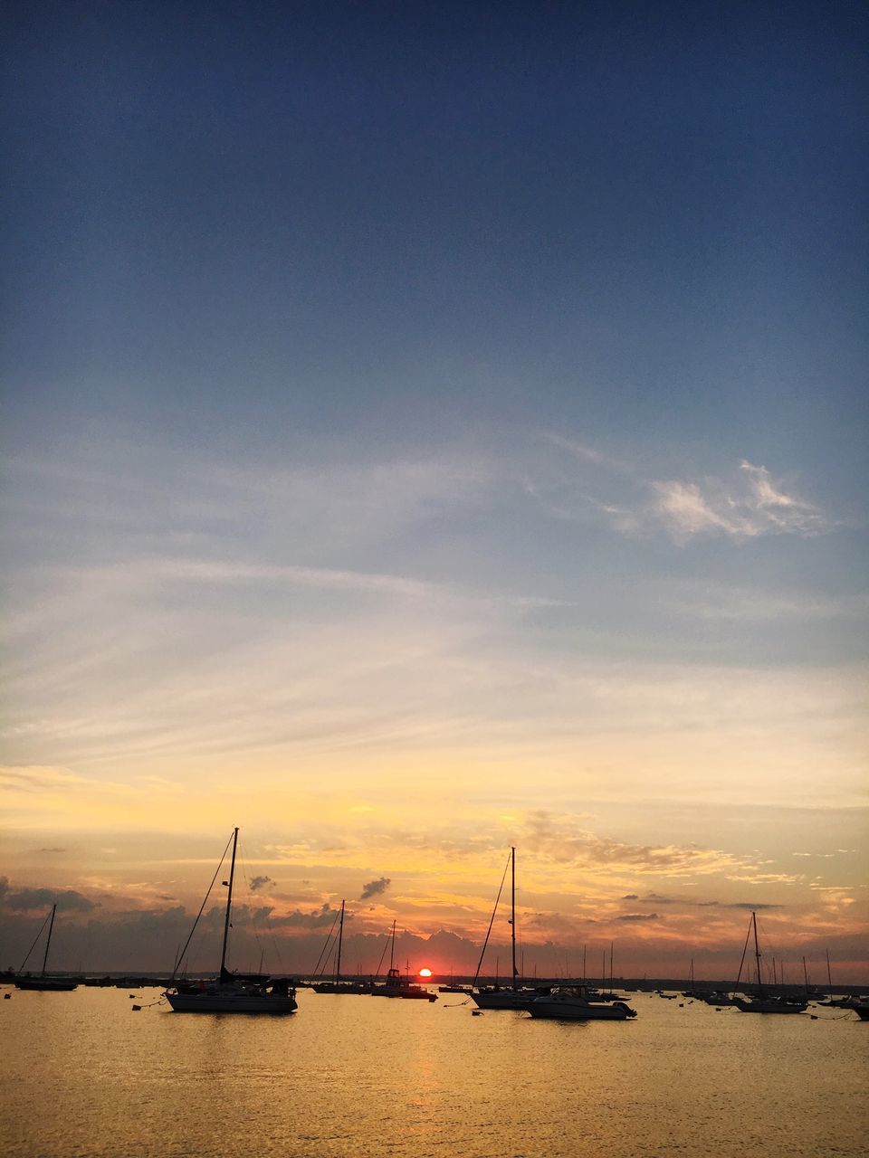 sea, water, sunset, sky, scenics, tranquility, tranquil scene, beauty in nature, horizon over water, boat, shore, nature, idyllic, orange color, cloud - sky, sailboat, outdoors, cloud, no people, non-urban scene, calm, ocean, remote, travel destinations, tourism